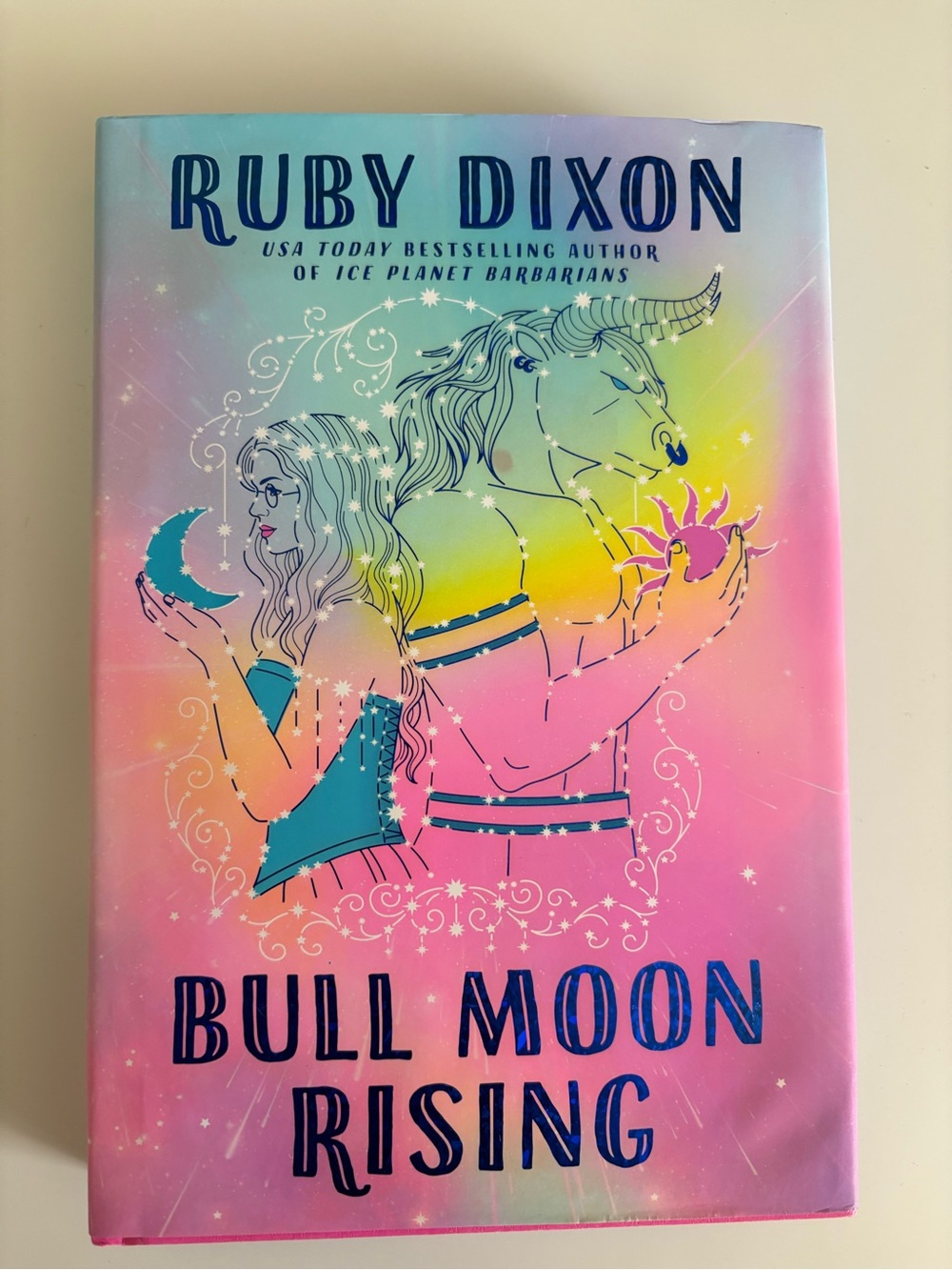 Bull Moon Rising by Ruby Dixon - Pastel Rainbow Hardcover